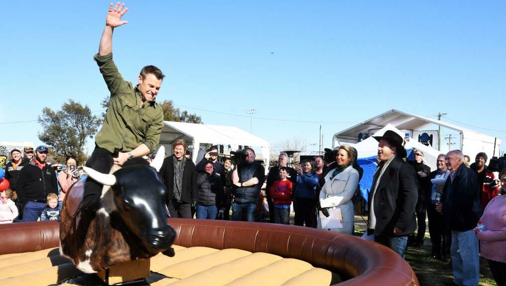 Actor Rodger Corser lets loose on the mechanical bull.