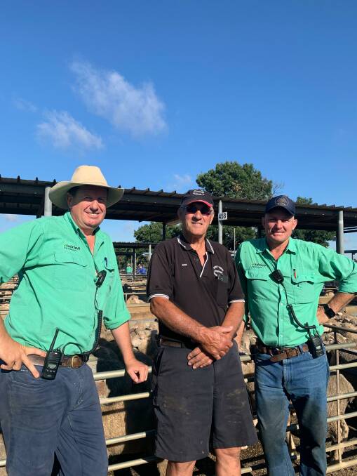 Ross Smith (centre) with Nutrien Wagga Wagga agents Peter Cabot (left) and James Croker (right) on Ross' last day in the saleyards. Photo: Ken Miall 