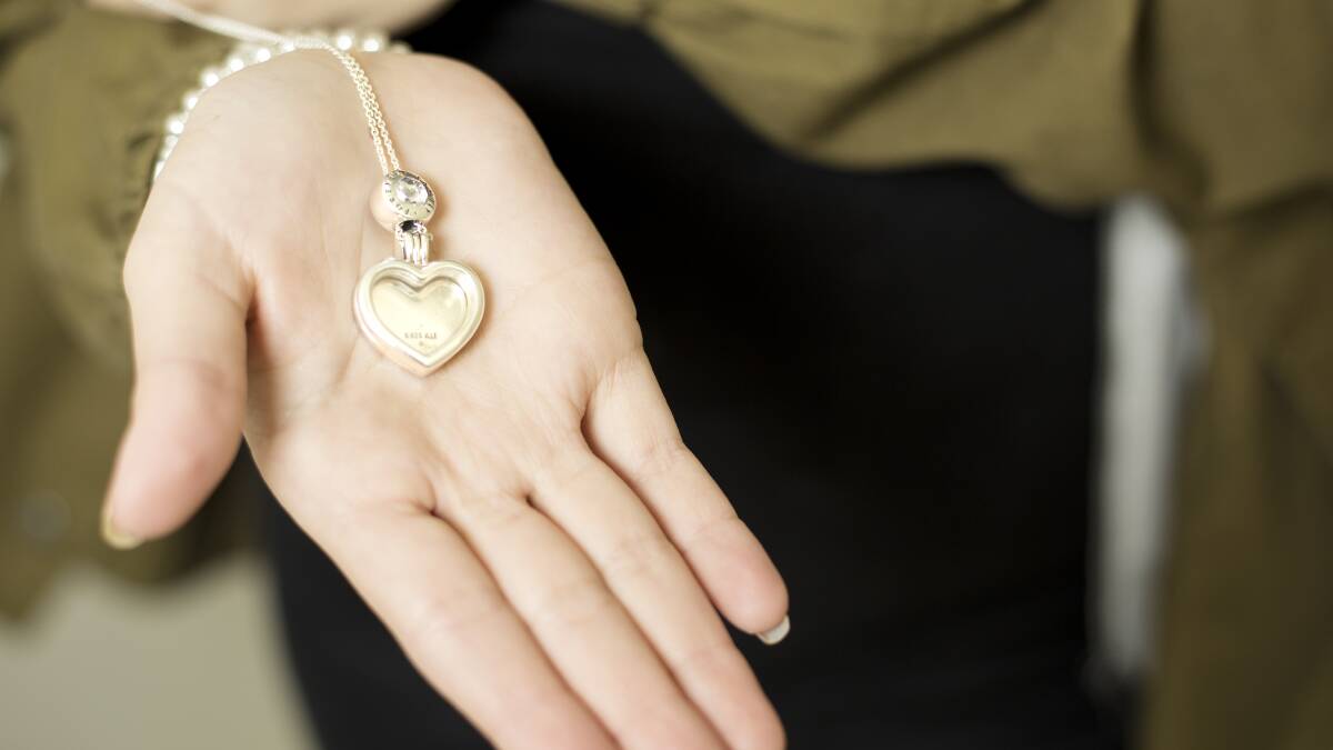 BELOW: Zoe received this locket for her birthday, acknowledging the date of her transplant. It also holds the anti-rejection drugs she will take daily for the rest of her life. Picture: ALEISHA MCCARRON