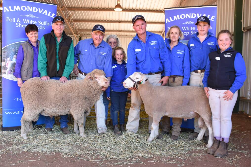Top price Poll and White Suffolk ram pictured with top priced poll ram purchasers Graham and Angela Sweeny and the Routley family, Peter, Marita, Ruby, Paul, Dallas, Lachlan and Grace