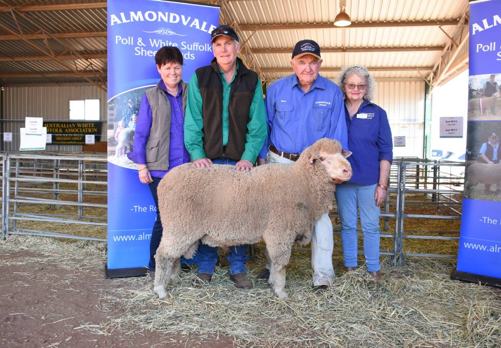 Top price Poll ram pictured with top price buyers Graham and Angela Sweeny and vendors Peter and Marita Routley.