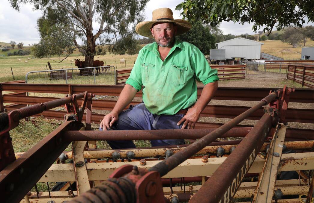 A DAY IN THE LIFE: Greg Nugent on his Tarcutta property, which he manages part time while working for the DPI. Picture: Les Smith

