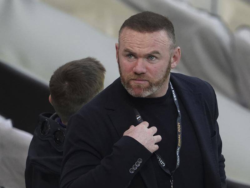 Derby coach Wayne Rooney has apologised to his family and club over photos taken of him at a party.