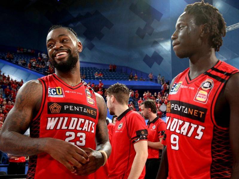 Perth Wildcats star Terrico White (L) hasn't completely given up hope of playing in the NBA one day.
