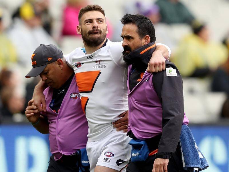 GWS star Stephen Coniglio will need scans after coming off in the Giants' AFL loss to Richmond.