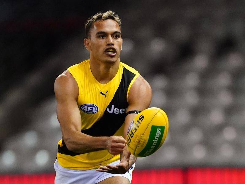 Richmond's Sydney Stack is still serving his lengthy AFL ban for an off-field incident in September.
