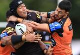 Brian To'o of the Panthers is tackled during his side's 22-6 victory over Wests Tigers in Bathurst. (Mark Evans/AAP PHOTOS)