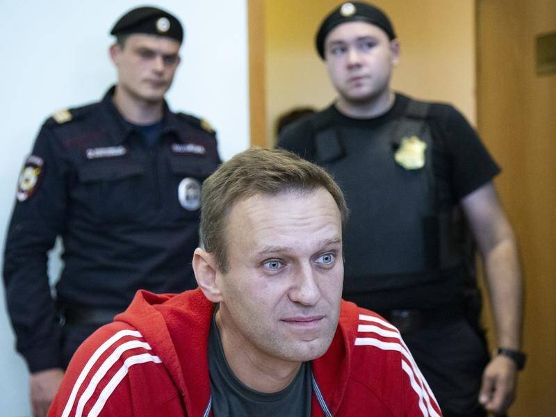 Alexei Navalny's foundation says Russian investigators want to talk to two of its employees.