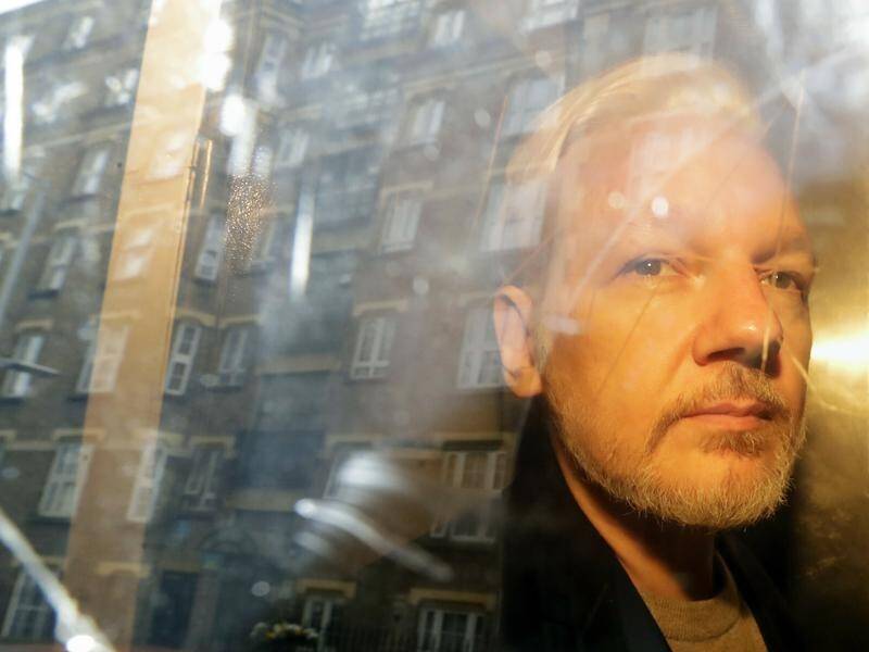 Julian Assange is appealing his extradition to the US on espionage charges in the UK's High Court. (AP PHOTO)