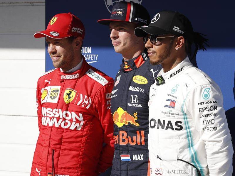 Max Verstappen (centre), has taken pole position at the Brazil Grand Prix.