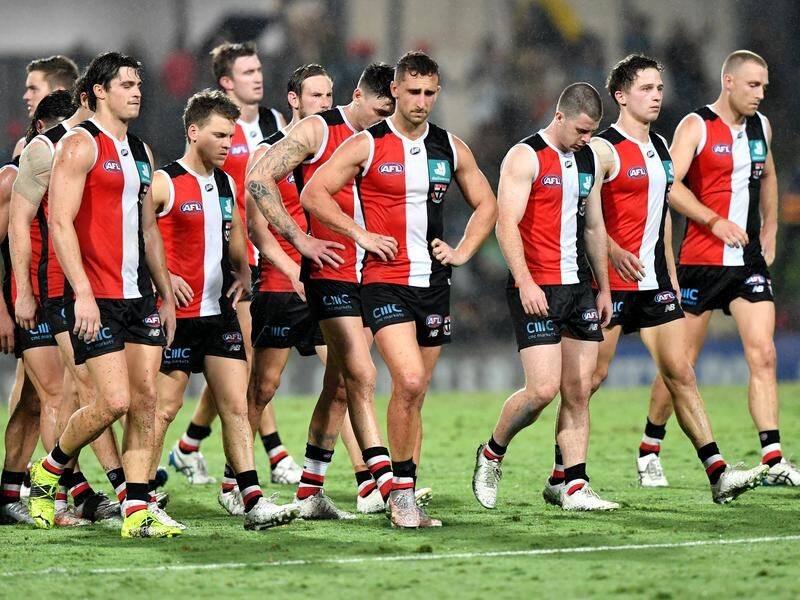 St Kilda's players trudge off after their agonising six-point defeat to Adelaide in the AFL.