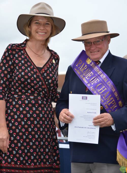 NSW Primary Industries minister Katrina Hodgkinson pictured with Kelvin Cronk from Old Junee who participated in the champions parade at the Sydney Royal Easter Show.