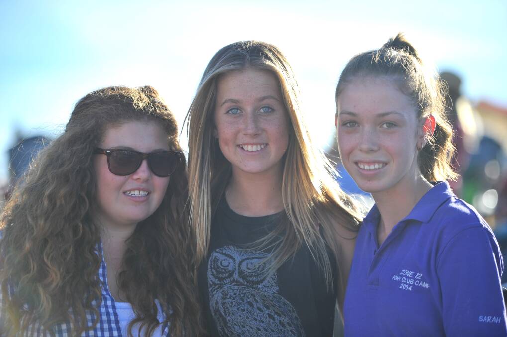 Jess Handley (12), Georgia Horne (13) and Jena Mazzocchi (13) of St Pauls College, Walla Walla at the Wagga Rodeo in 2013.