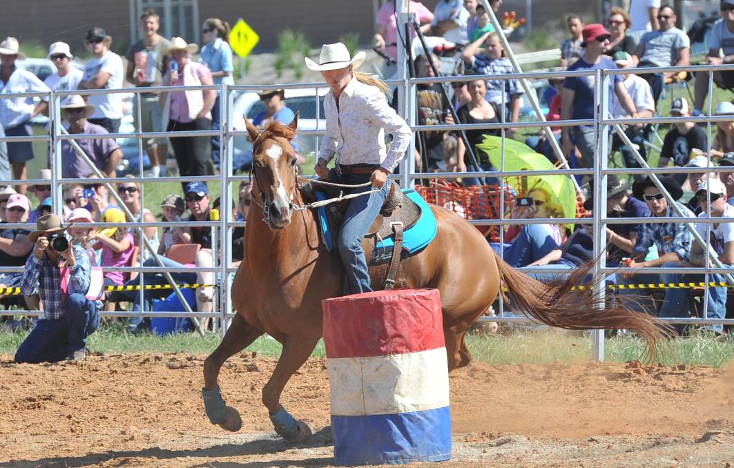 Tayla Johnston competes in the barrel race at the Wagga Rodeo in 2012.