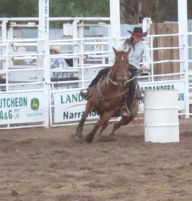 Barrel racing competitor Tamlin Osbourne from Lake Rowan Victoria rides at the Narrandera Rodeo. Picture: Lisa Dunn