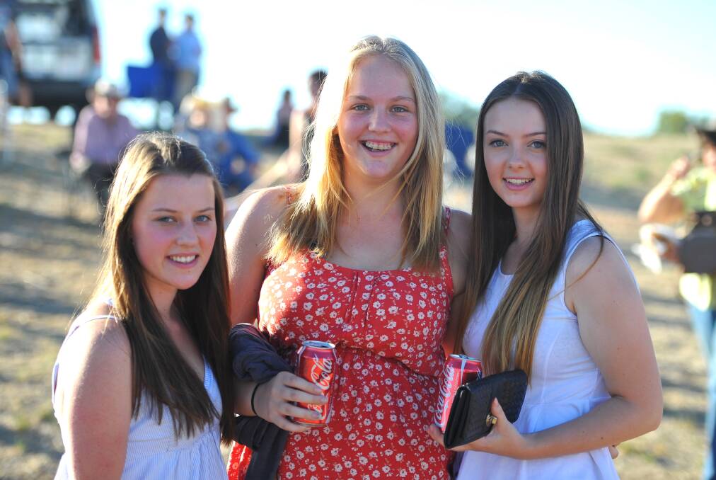 Janelle Bushell, 17, Catelyn Ward,16 and Marney Sparks, 16 of Wagga at the Wagga Rodeo in 2013. Pictures: Addison Hamilton 