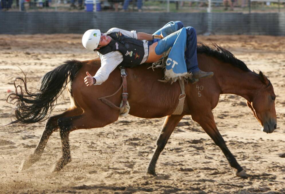 A bareback competitor at Narrandera Rodeo. Pictures: Les Smith