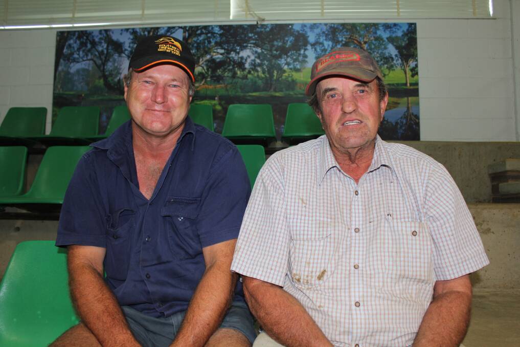 Graeme Salau of Mangoplah and George Wilson of RH Blakes and Co. at the Wagga Cattle sale. Photo: Holly Martin 